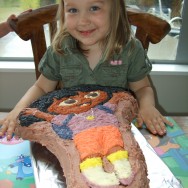 Ayla with her amazing Dora cake!