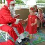 Santa gives Poppy a present
