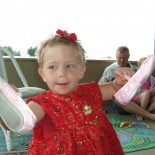 Poppy opens her gift from Santa - ballet shoes!