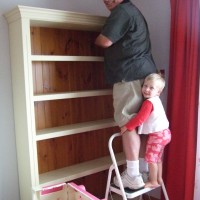 Helping Yogi fix to the wall