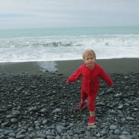 Collecting more white stones before leaving the coast
