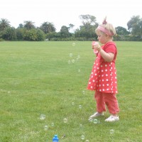 Poppy blowing bubbles
