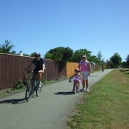 Poppy biking on the railway reserve