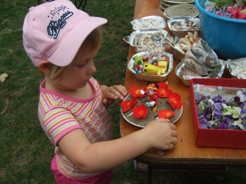 Making her sand saucer