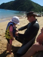 Steve gears Poppy up in a lifejacket