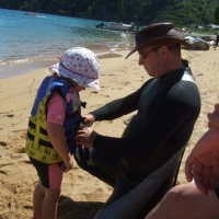 Steve gears Poppy up in a lifejacket