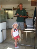 Jan takes her fish for preparation.