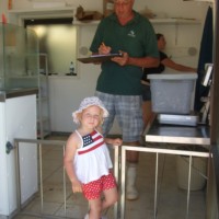Jan takes her fish for preparation.