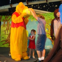 Poppy helping on stage