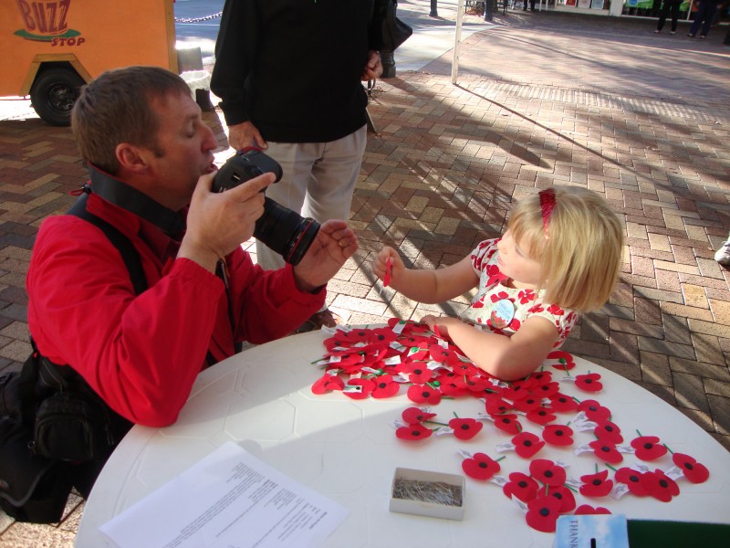 Nelson Mail photographer Martin taking Poppy's photo for the Nelson Mail tonight