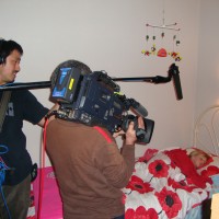 Filming Poppy asleep in her bed