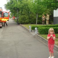 Watching the firemen put out a fire Watching the firemen put out a fire