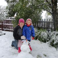 Adrienne & Poppy with the snowman