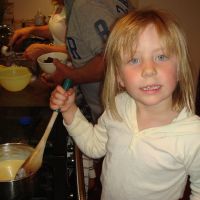 Helping GranJan make custard for dessert
