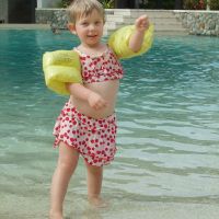 Poppy dancing at the pool