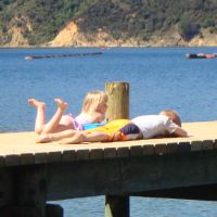 Poppy & Azzan waiting on the jetty