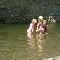 Bec with the girls exploring in the river