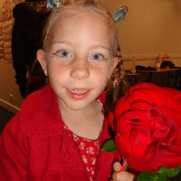 Poppy with the rose Yogi handed her at the final bows