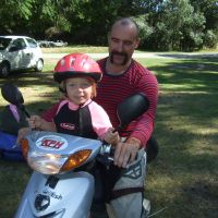 Shaun gives Poppy a ride on his scooter Shaun gives Poppy a ride on his scooter